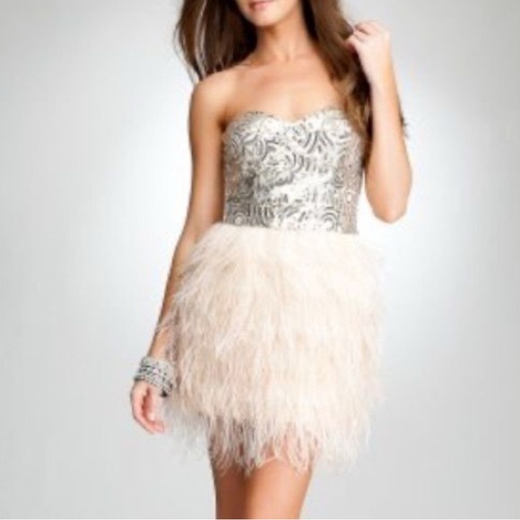 bebe Dresses & Skirts - Bebe sequin feather dress